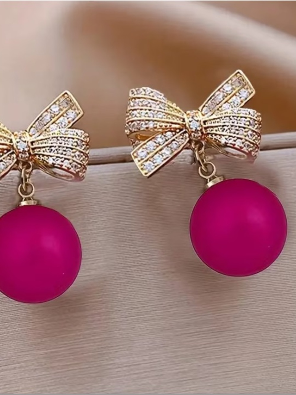 Gold Bow Stud Earrings with Drop Fuchsia Pink Spheres